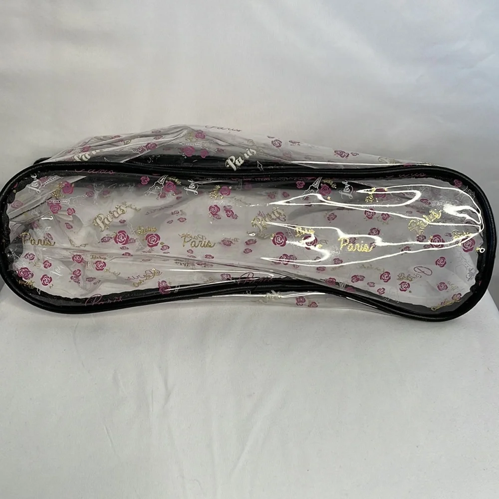 Clear cosmetic makeup bag with pink roses and Eiffel Tower gold hardware tassel